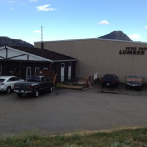 A lumber store with a beige and brown exterior, marked 
